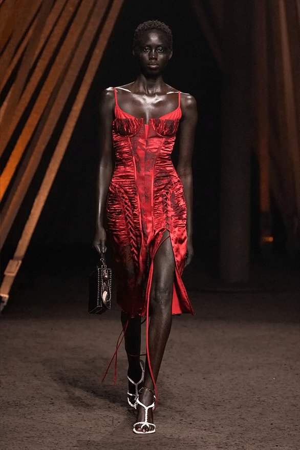 alexander mcqueen red dress runway Alexander McQueen's Most Shocking Runway Moments