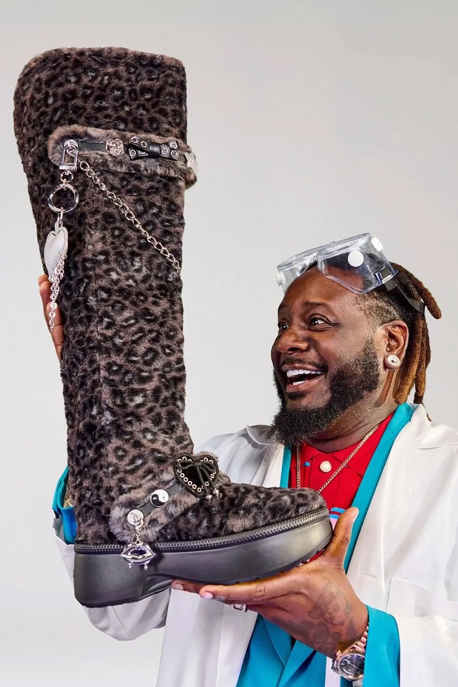 Crocs and T-Pain Show off Boots With the Fur Crocs Classic Unfurgettable Leopard Knee High Boot black 212387-0CU