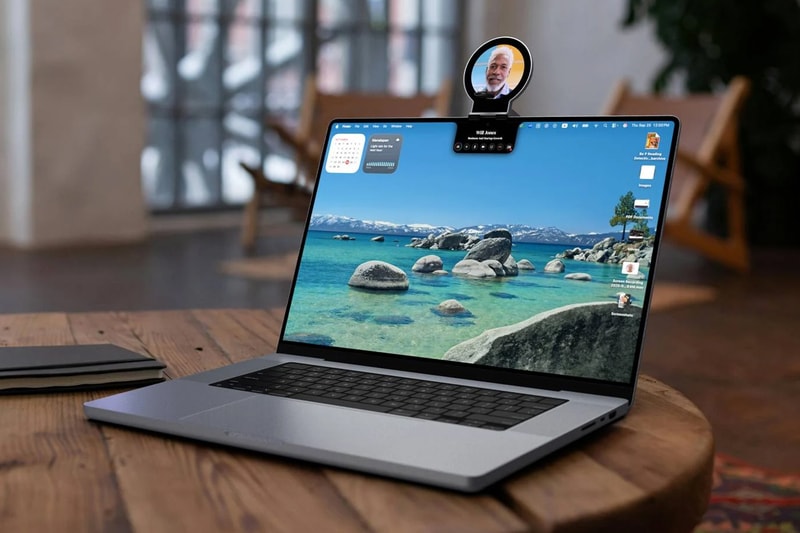 Napster View holographic display projecting AI companions beside a Mac as part of the Napster 26 platform