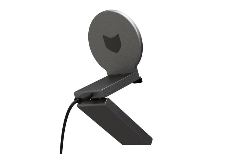 Napster View holographic display projecting AI companions beside a Mac as part of the Napster 26 platform