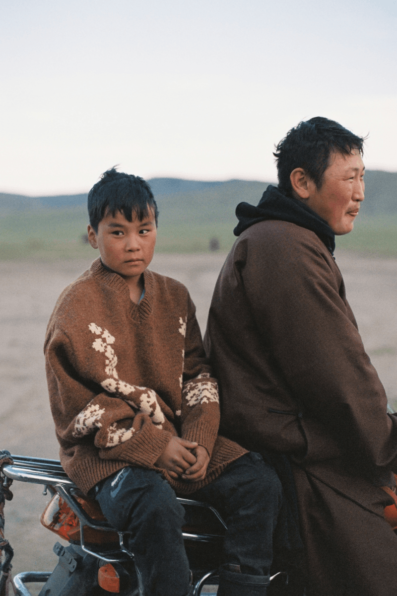 Mongolian steppe A Kind Of Guise's FW25 collection, Altai Mirage, Artist Jonathan Niclaus, Italian cotton corduroy, lambswool and hairy wool blends, purple dragon emblem,Dragon Wool Jacket and the Khivs Pullover.