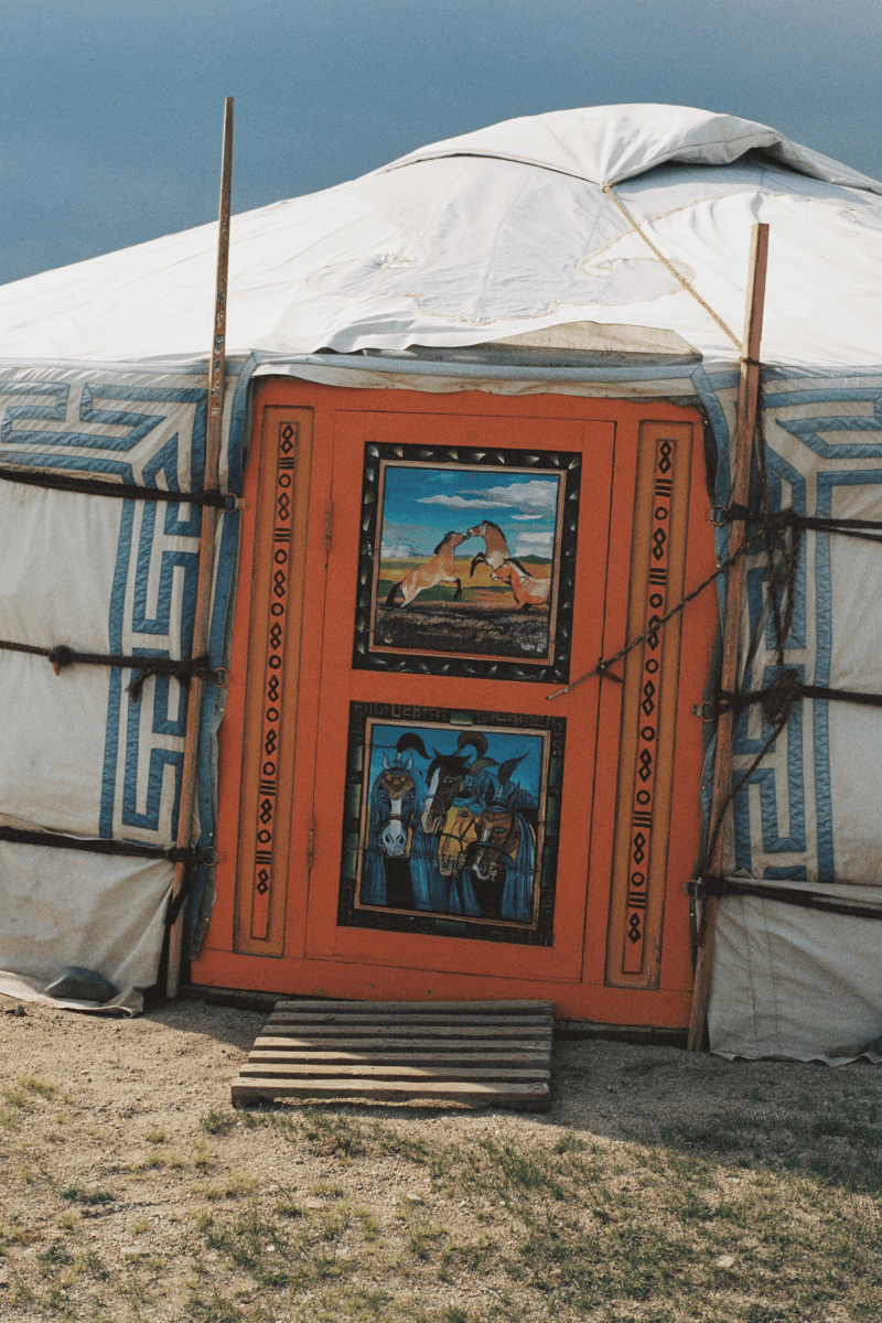 Mongolian steppe A Kind Of Guise's FW25 collection, Altai Mirage, Artist Jonathan Niclaus, Italian cotton corduroy, lambswool and hairy wool blends, purple dragon emblem,Dragon Wool Jacket and the Khivs Pullover.