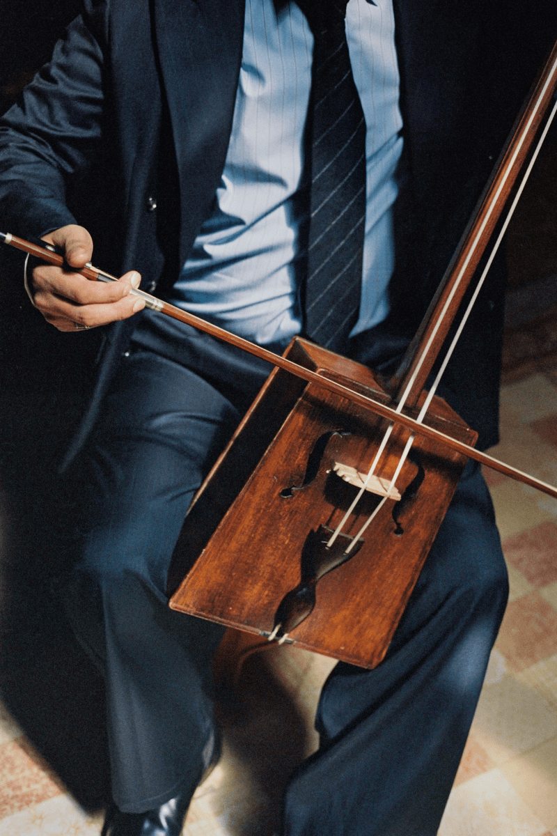 Mongolian steppe A Kind Of Guise's FW25 collection, Altai Mirage, Artist Jonathan Niclaus, Italian cotton corduroy, lambswool and hairy wool blends, purple dragon emblem,Dragon Wool Jacket and the Khivs Pullover.