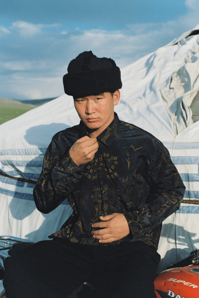 Mongolian steppe A Kind Of Guise's FW25 collection, Altai Mirage, Artist Jonathan Niclaus, Italian cotton corduroy, lambswool and hairy wool blends, purple dragon emblem,Dragon Wool Jacket and the Khivs Pullover.