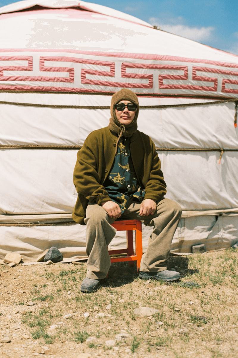 Mongolian steppe A Kind Of Guise's FW25 collection, Altai Mirage, Artist Jonathan Niclaus, Italian cotton corduroy, lambswool and hairy wool blends, purple dragon emblem,Dragon Wool Jacket and the Khivs Pullover.