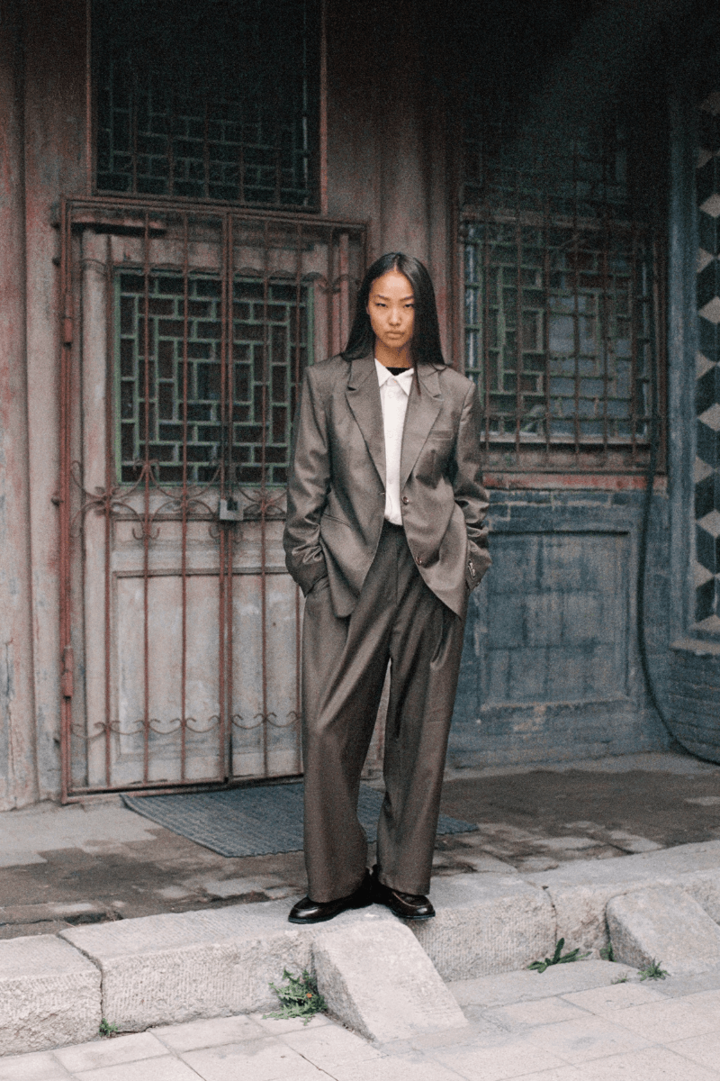 Mongolian steppe A Kind Of Guise's FW25 collection, Altai Mirage, Artist Jonathan Niclaus, Italian cotton corduroy, lambswool and hairy wool blends, purple dragon emblem,Dragon Wool Jacket and the Khivs Pullover.