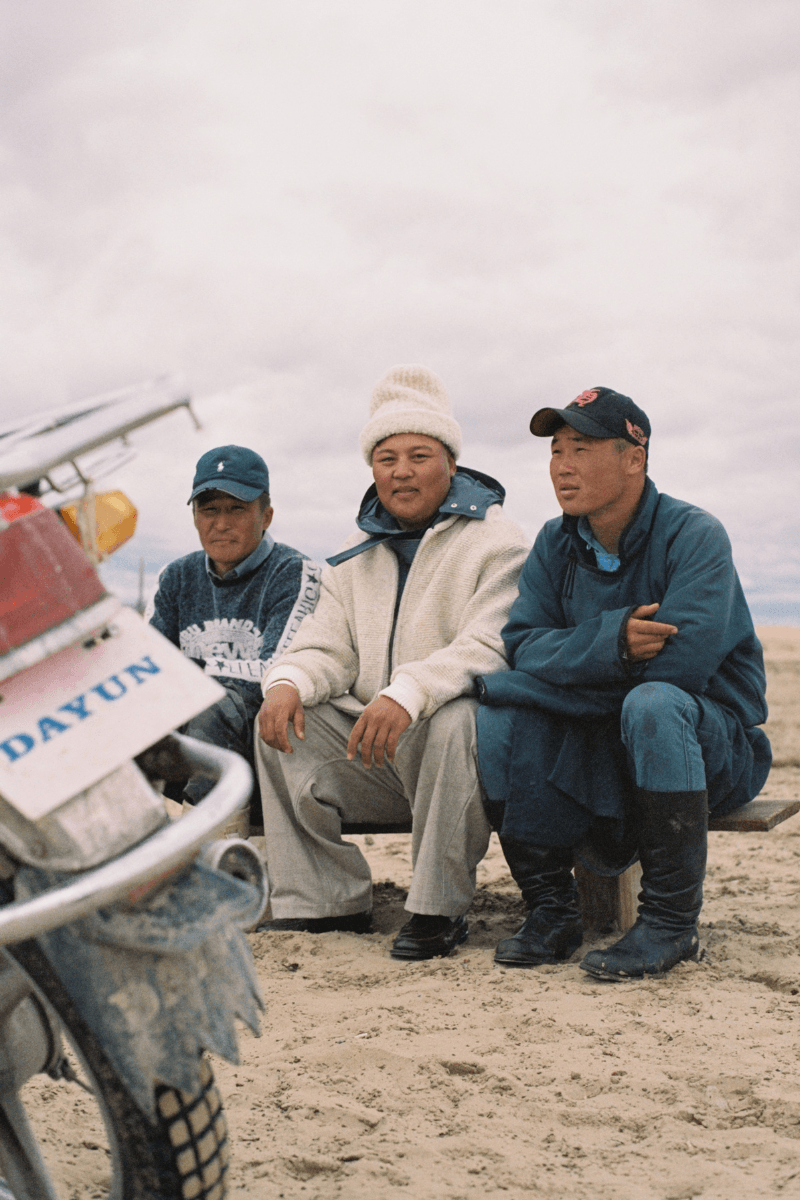Mongolian steppe A Kind Of Guise's FW25 collection, Altai Mirage, Artist Jonathan Niclaus, Italian cotton corduroy, lambswool and hairy wool blends, purple dragon emblem,Dragon Wool Jacket and the Khivs Pullover.