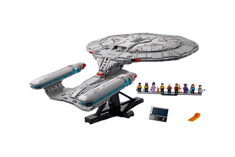 LEGO Icons Star Trek: U.S.S. Enterprise NCC-1701-D with nine TNG minifigures arranged on an angled display stand