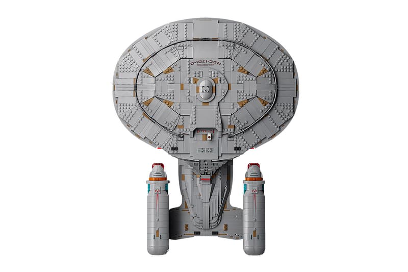 LEGO Icons Star Trek: U.S.S. Enterprise NCC-1701-D with nine TNG minifigures arranged on an angled display stand