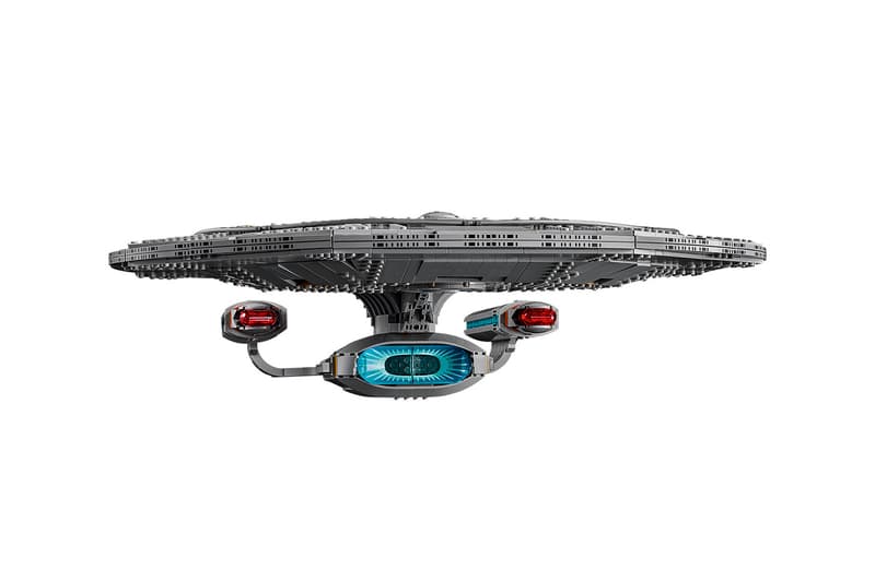 LEGO Icons Star Trek: U.S.S. Enterprise NCC-1701-D with nine TNG minifigures arranged on an angled display stand