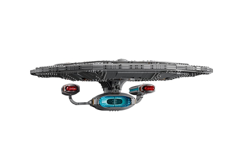 LEGO Icons Star Trek: U.S.S. Enterprise NCC-1701-D with nine TNG minifigures arranged on an angled display stand