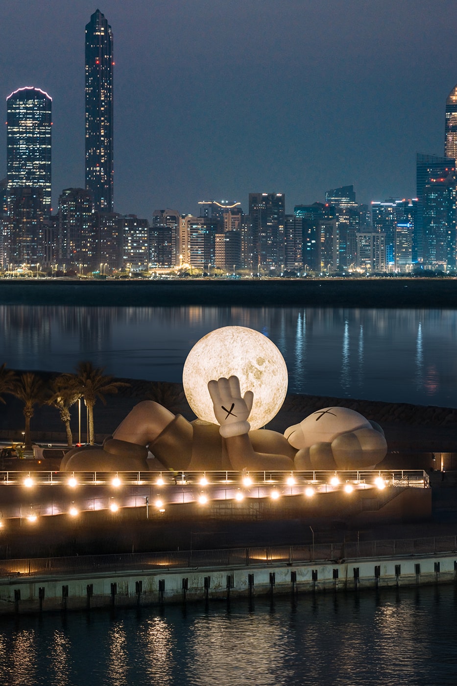 KAWS:HOLIDAY Lands in Abu Dhabi uae souq al mina companion sculpture allrightsreserved arr