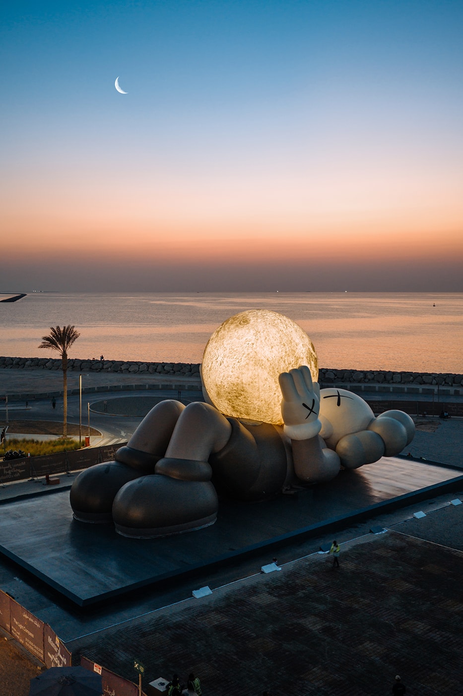 KAWS:HOLIDAY Lands in Abu Dhabi uae souq al mina companion sculpture allrightsreserved arr