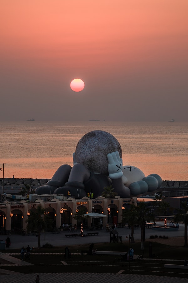 KAWS:HOLIDAY Lands in Abu Dhabi uae souq al mina companion sculpture allrightsreserved arr