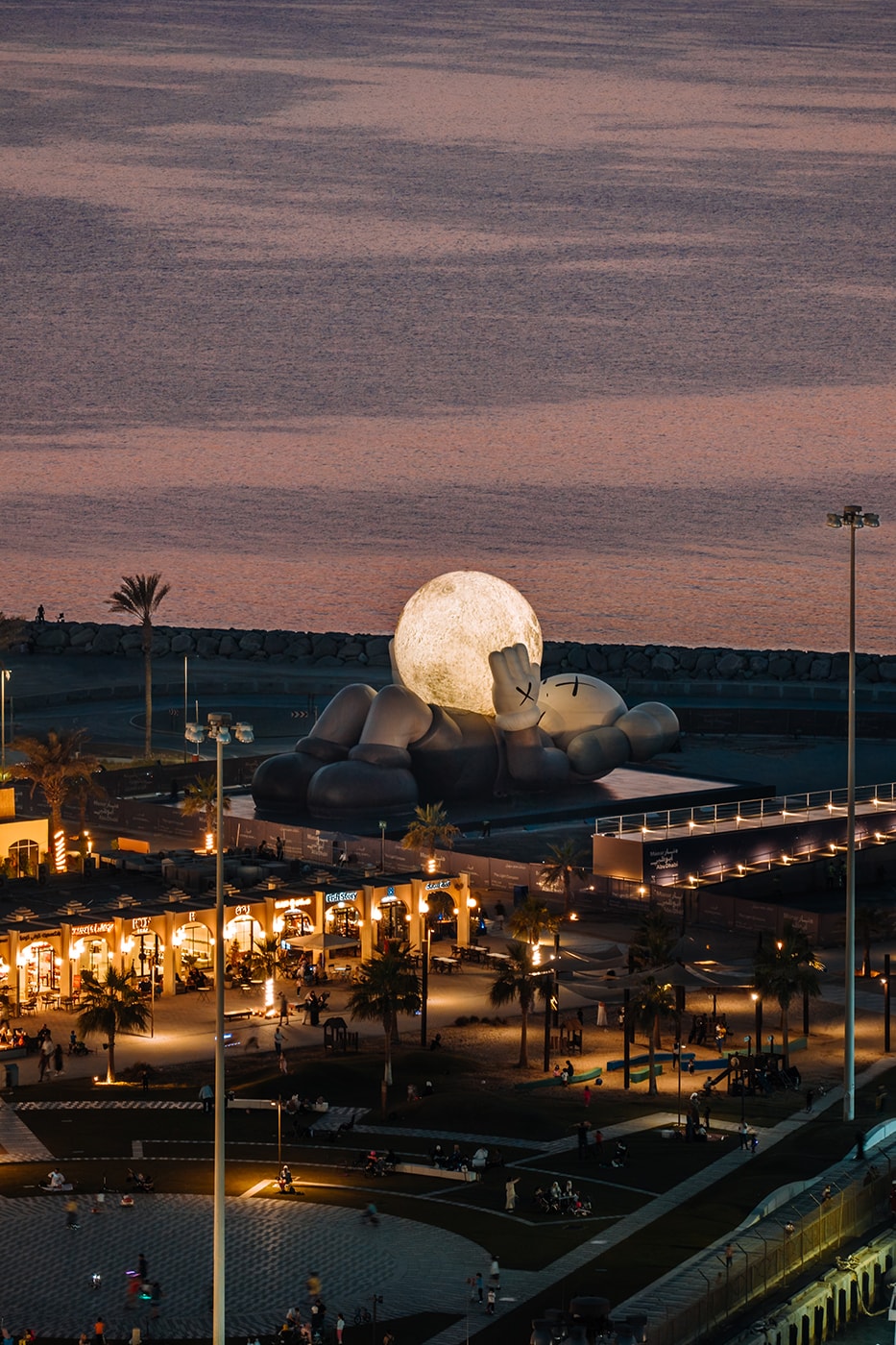 KAWS:HOLIDAY Lands in Abu Dhabi uae souq al mina companion sculpture allrightsreserved arr