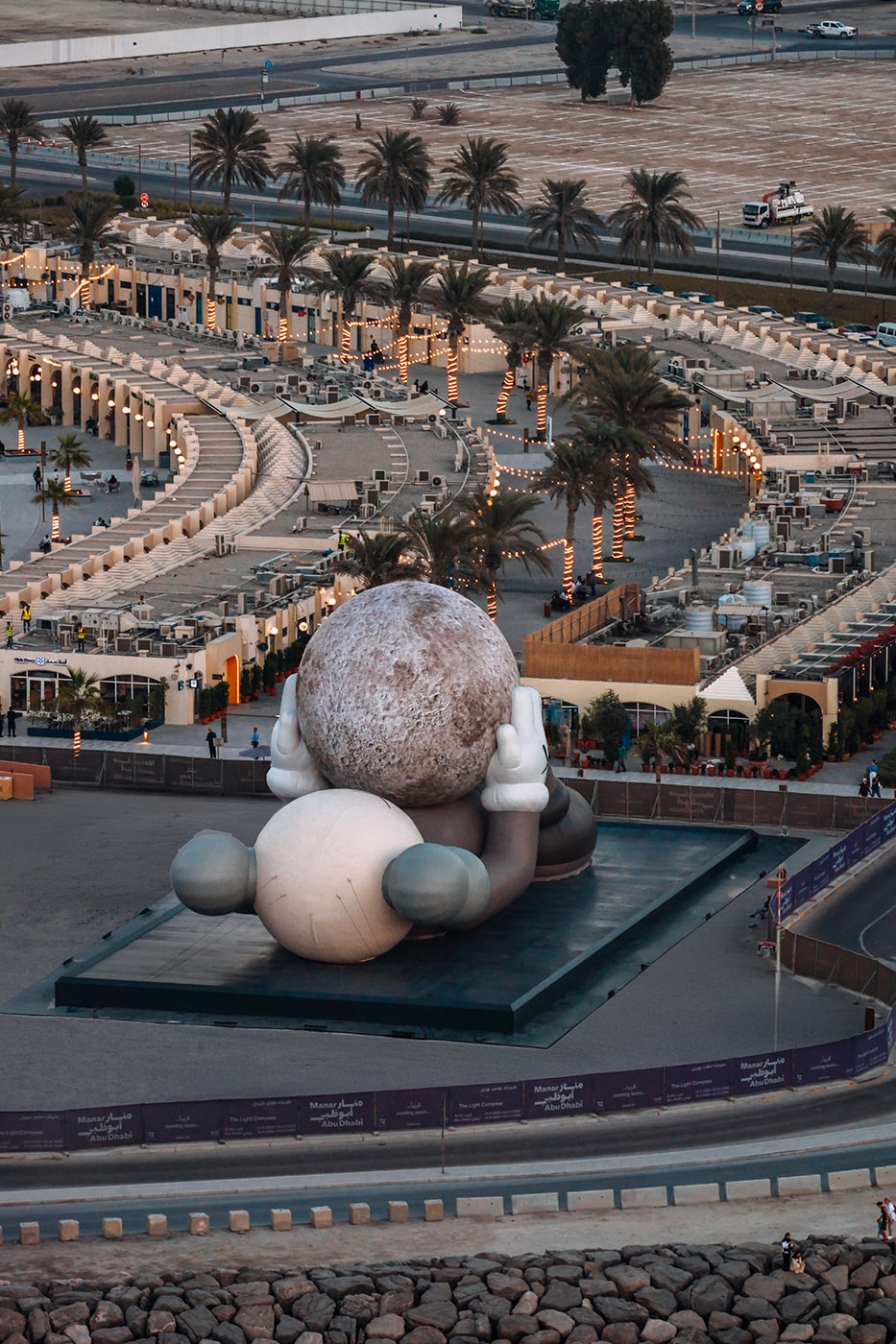 KAWS:HOLIDAY Lands in Abu Dhabi uae souq al mina companion sculpture allrightsreserved arr