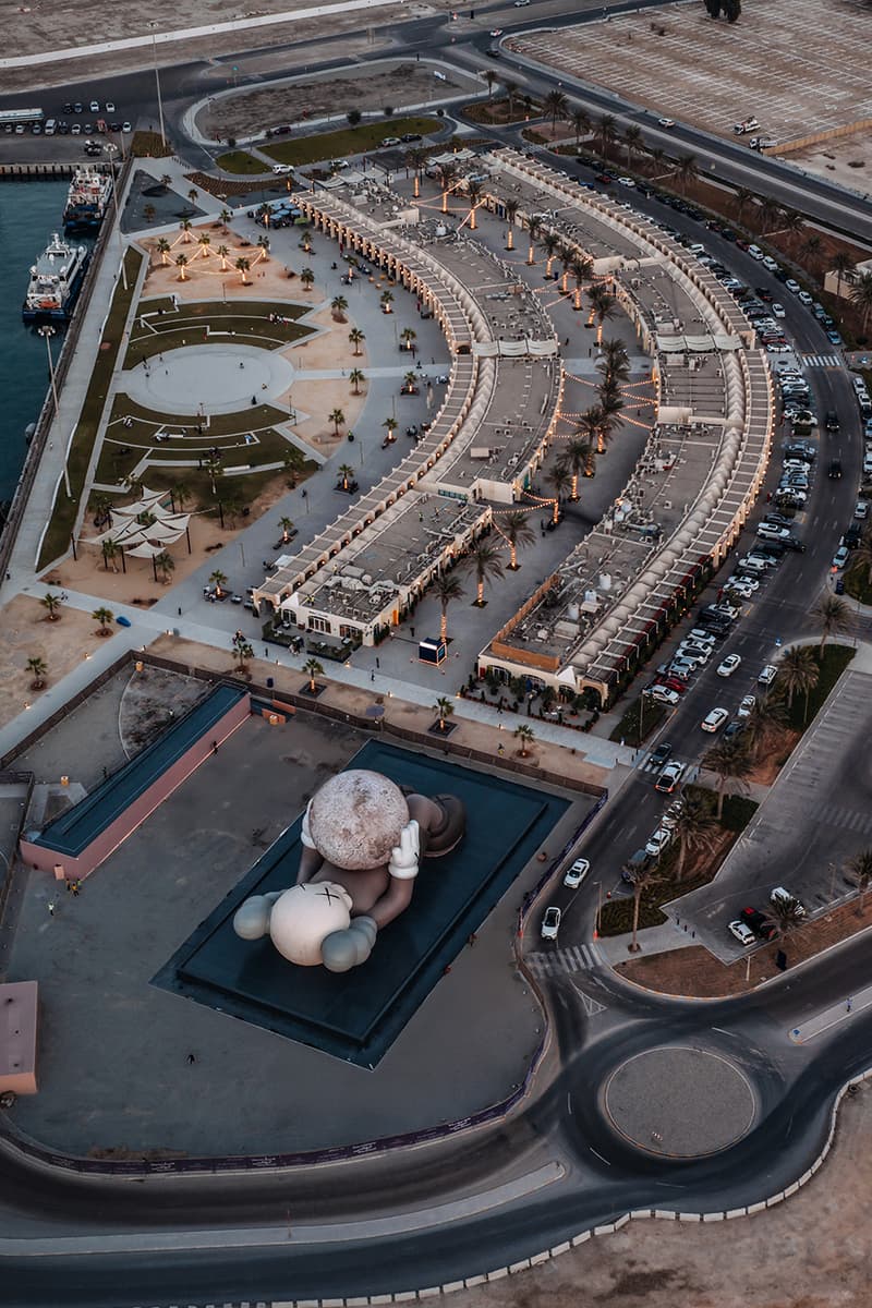 KAWS:HOLIDAY Lands in Abu Dhabi uae souq al mina companion sculpture allrightsreserved arr