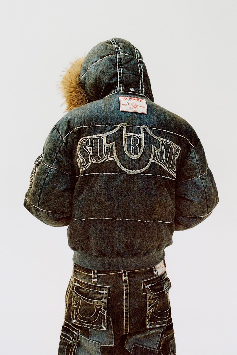 Supreme x True Religion Fall 2025 Collaboration denim jeans release info Leather Trucker Jacket, Puffer Jacket, L/S Shirt, Polo, Zip Up Hooded Sweatshirt, Leather Pant, Cargo Pant, Sweatpant, Earflap 5-Panel, 6-Panel and Beanie
