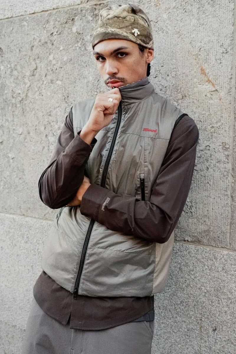 JJJJound x Descente Fall 2025 Collaboration Is All About Urban Utility montreal canada brand windbreaker pants vests realtree beanies toque own Jacket and Hardshell Parka, alongside versatile layers such as a Reversible Jacket and Vest, Hardshell Pants, and foundational apparel like a Button-Up Shirt and Warm-Up Longsleeve. Accessories, including a Crossbody Bag, Duffle Bag, and various hats and socks