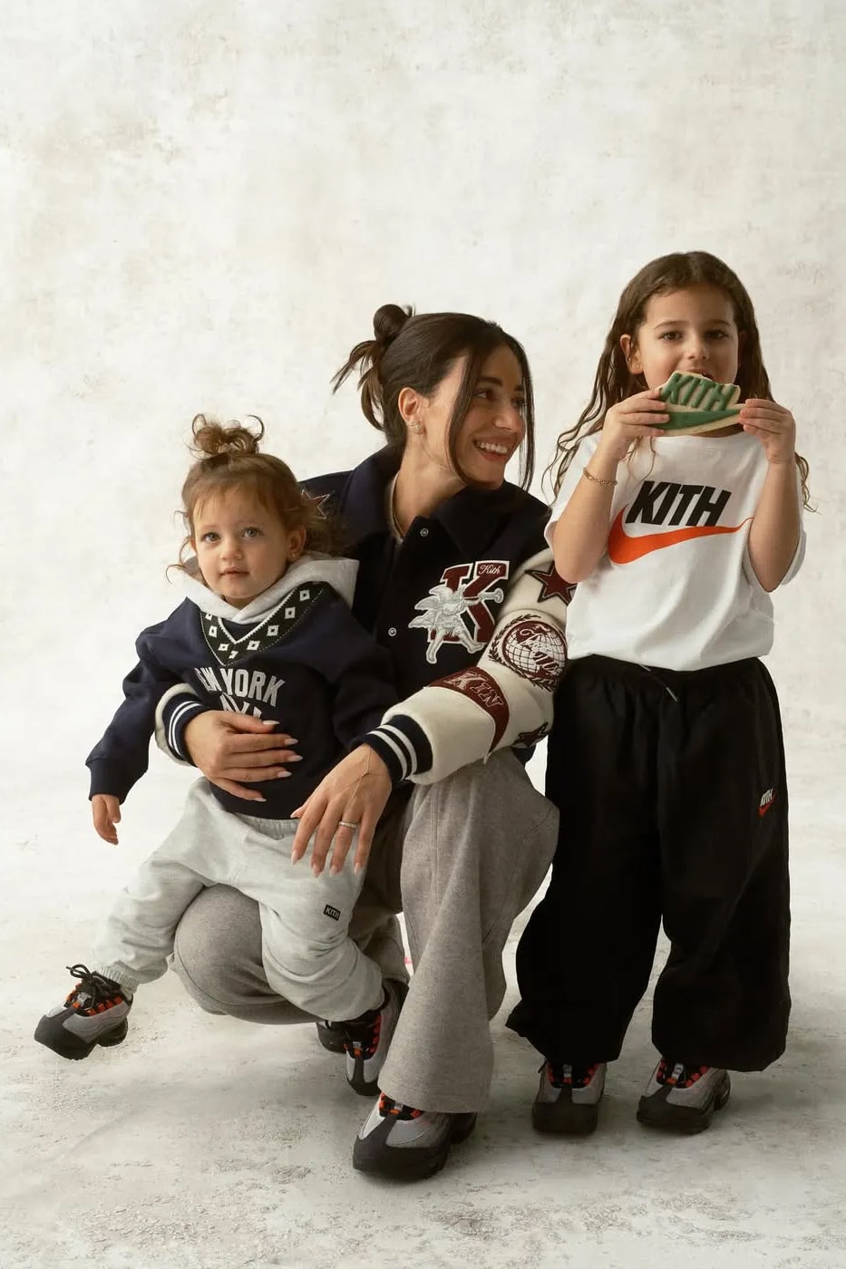 Ronnie Fieg Drops Kith x Nike Kids Holiday 2025 Collection air force 1 low air max 95 swoosh sweaters sweatpants varsity jackets denim