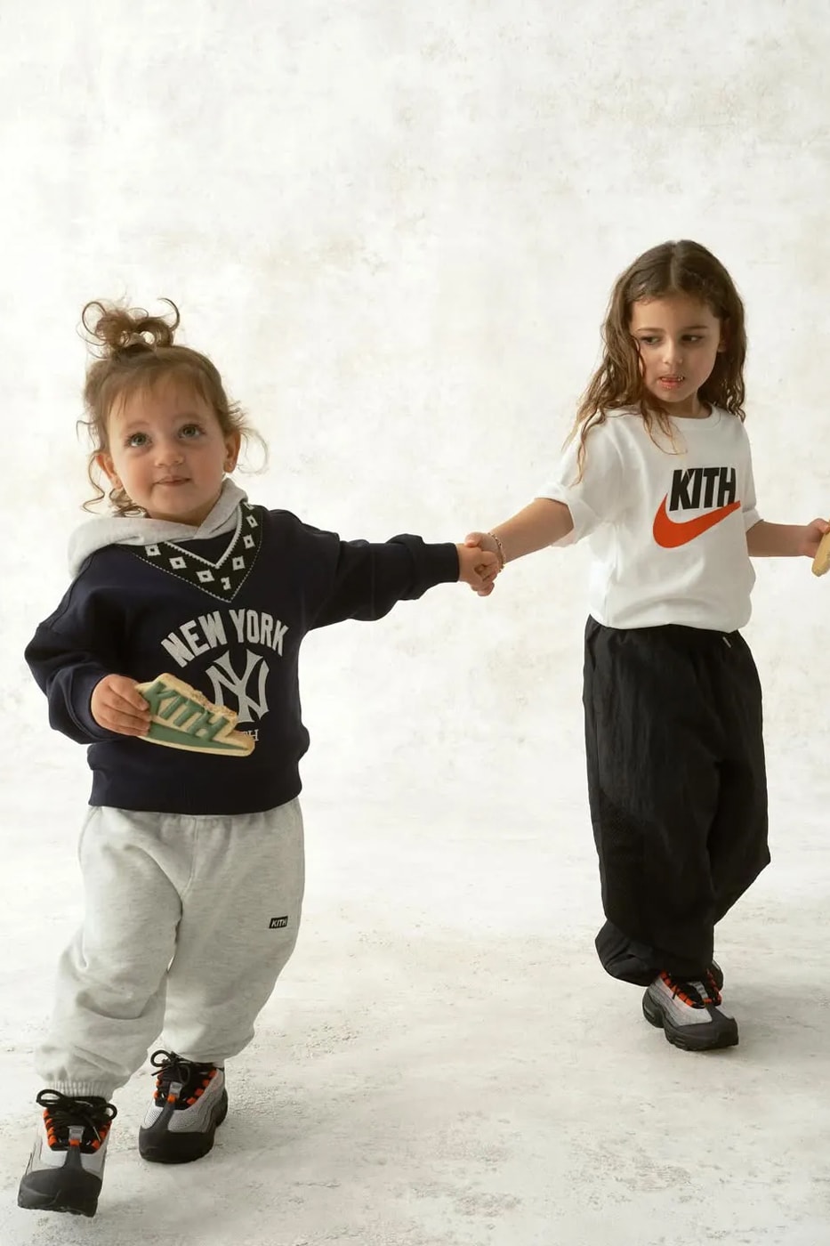Ronnie Fieg Drops Kith x Nike Kids Holiday 2025 Collection air force 1 low air max 95 swoosh sweaters sweatpants varsity jackets denim