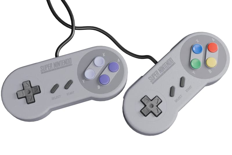 Epilogue SN Operator transparent USB-C dock connected to a computer with an original SNES cartridge inserted