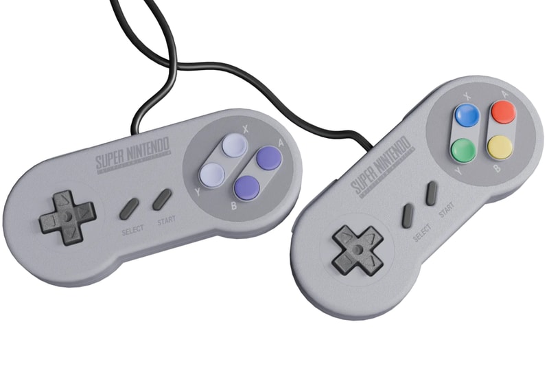Epilogue SN Operator transparent USB-C dock connected to a computer with an original SNES cartridge inserted