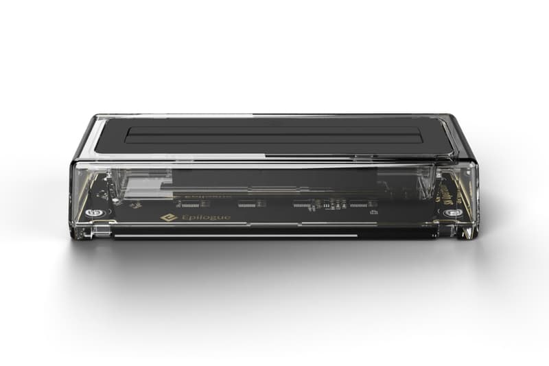 Epilogue SN Operator transparent USB-C dock connected to a computer with an original SNES cartridge inserted