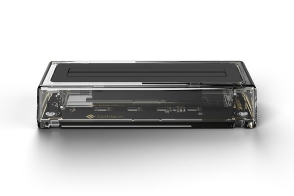 Epilogue SN Operator transparent USB-C dock connected to a computer with an original SNES cartridge inserted