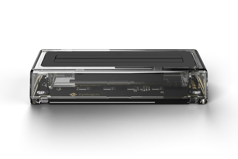 Epilogue SN Operator transparent USB-C dock connected to a computer with an original SNES cartridge inserted