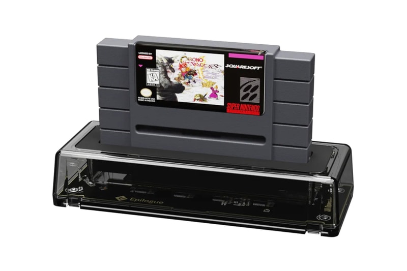 Epilogue SN Operator transparent USB-C dock connected to a computer with an original SNES cartridge inserted
