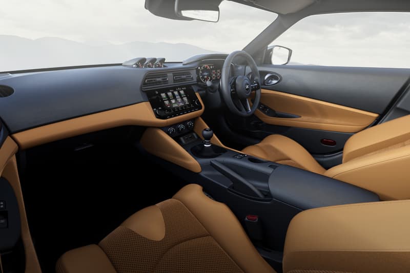 2027 Nissan Fairlady Z facelift in Unryu Green showcasing new two-piece grille and Nismo manual performance variant at Tokyo Auto Salon