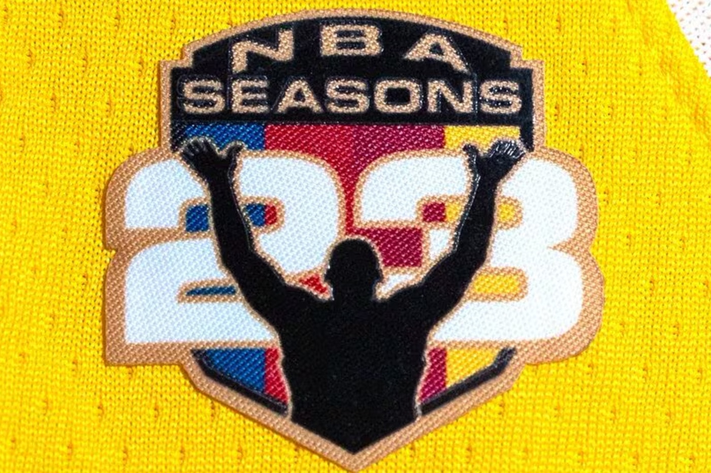 LeBron James wearing Lakers jersey featuring special 23 NBA Seasons patch above the Nike Swoosh, created for Topps trading cards