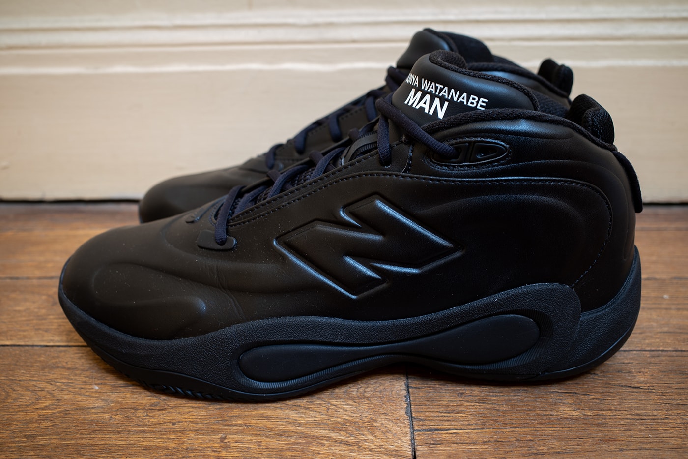 Closer Look at the Junya Watanabe MAN x New Balance P400 Revealed During PFW FW26 two colorways triple black white