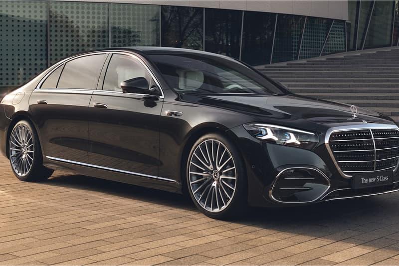 2027 Mercedes-Benz S-Class showcasing illuminated grille and triple-screen MBUX Superscreen interior with MB.OS supercomputer