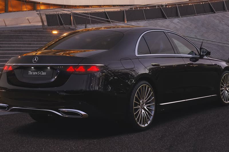2027 Mercedes-Benz S-Class showcasing illuminated grille and triple-screen MBUX Superscreen interior with MB.OS supercomputer