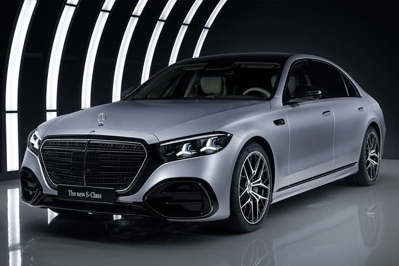 2027 Mercedes-Benz S-Class showcasing illuminated grille and triple-screen MBUX Superscreen interior with MB.OS supercomputer