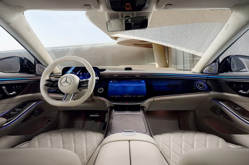 2027 Mercedes-Benz S-Class showcasing illuminated grille and triple-screen MBUX Superscreen interior with MB.OS supercomputer