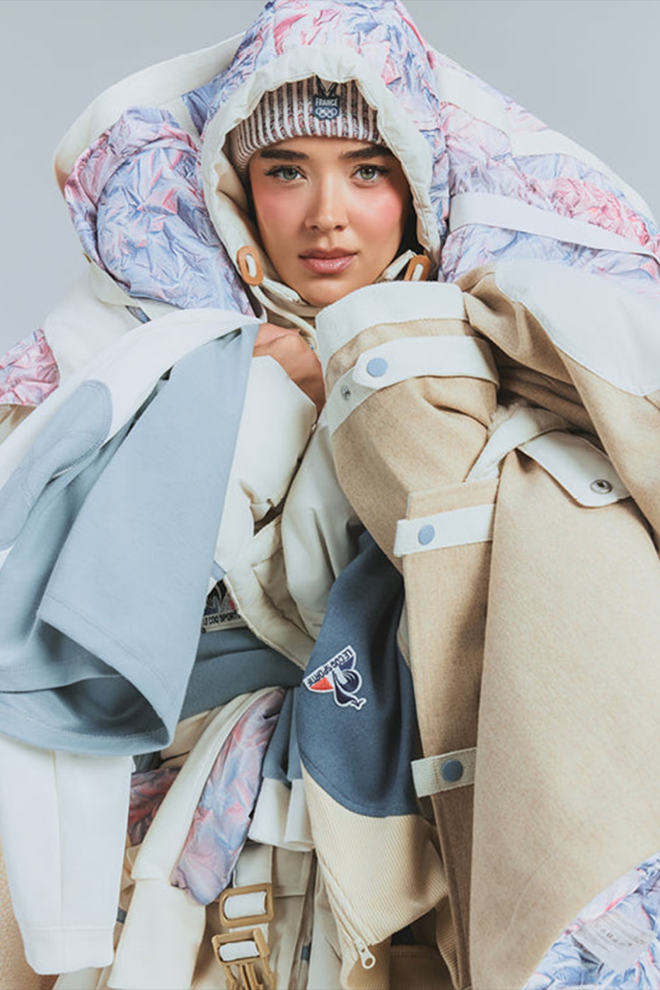 Our Pick of the Best Team Uniforms for the 2026 Winter Olympics lululemon adidas uniqlo salomon ralph lauren 66north le coq sportif goyol chasmere salomon kathmandu canada france great britain uk volunteers new zealand iceland sweden usa