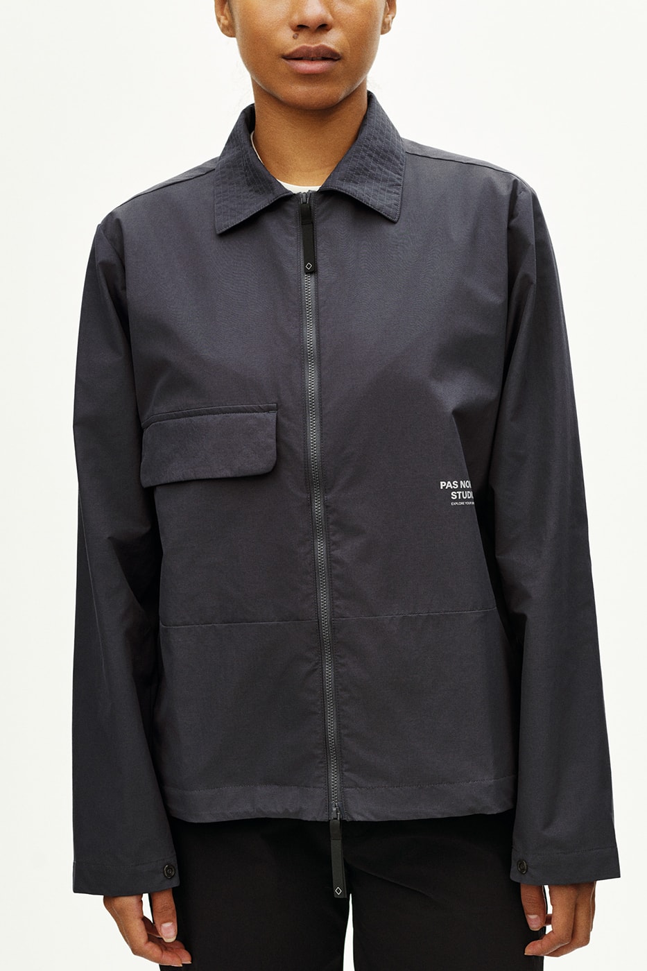 Pas Normal Studios SS26 Off-Race blends cycling utility with everyday style, featuring Polartec® fleece and waterproof commuters.