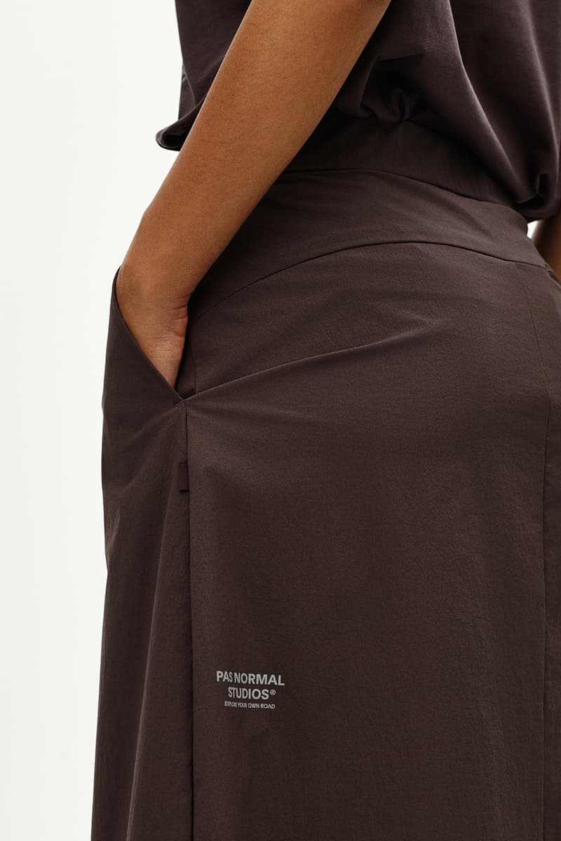 Pas Normal Studios SS26 Off-Race blends cycling utility with everyday style, featuring Polartec® fleece and waterproof commuters.