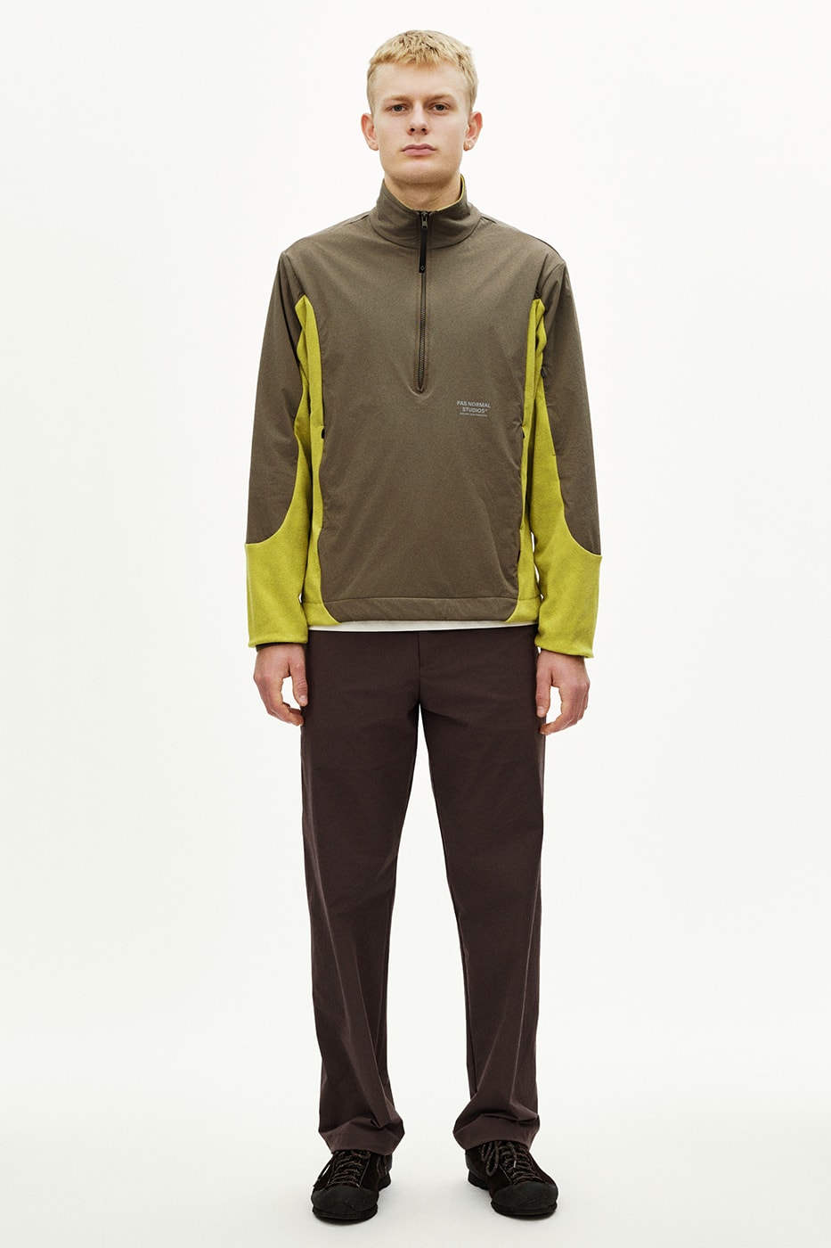 Pas Normal Studios SS26 Off-Race blends cycling utility with everyday style, featuring Polartec® fleece and waterproof commuters.