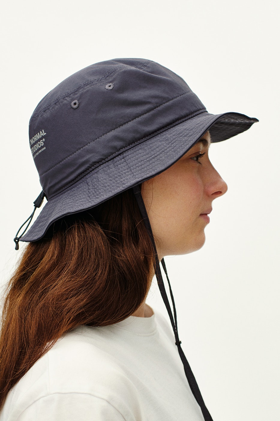 Pas Normal Studios SS26 Off-Race blends cycling utility with everyday style, featuring Polartec® fleece and waterproof commuters.