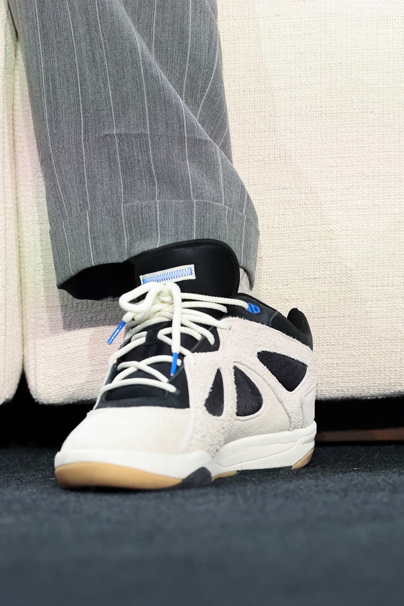 Fit Check: Bad Bunny Arrives in a Bottega Veneta Suit and Never-Before-Seen adidas BadBo 1.0s at Apple Music Super Bowl LIX Halftime Show Press Conference