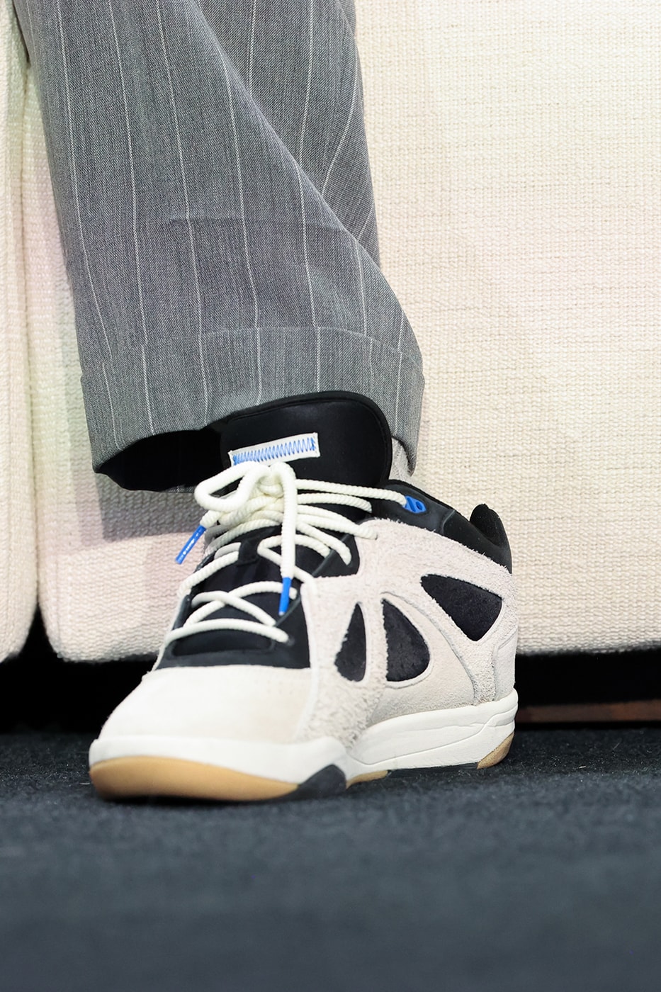 Fit Check: Bad Bunny Arrives in a Bottega Veneta Suit and Never-Before-Seen adidas BadBo 1.0s at Apple Music Super Bowl LIX Halftime Show Press Conference