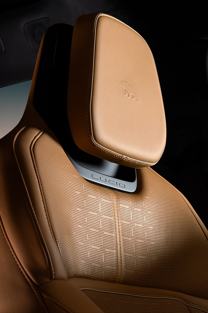 lucid gravity electric vehicle suv seven seater berlin seven suite touring grand living space frunk floating screens leather seats massage 