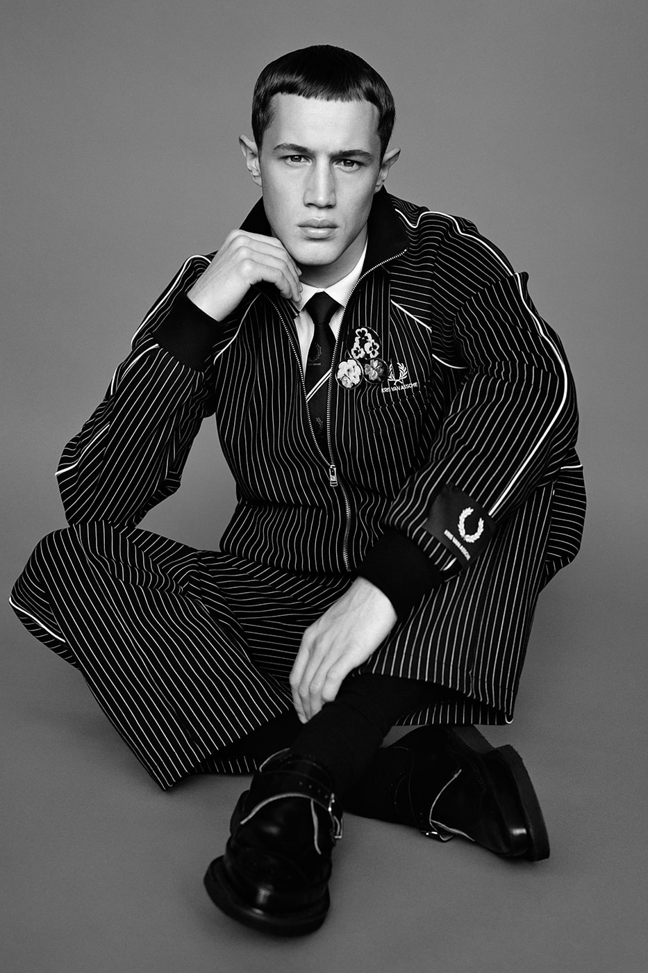Kris Van Assche Reinvents the "Uniform of Youth" in Debut Fred Perry Collaboration lookbooks dior homme berluit british belgian designer