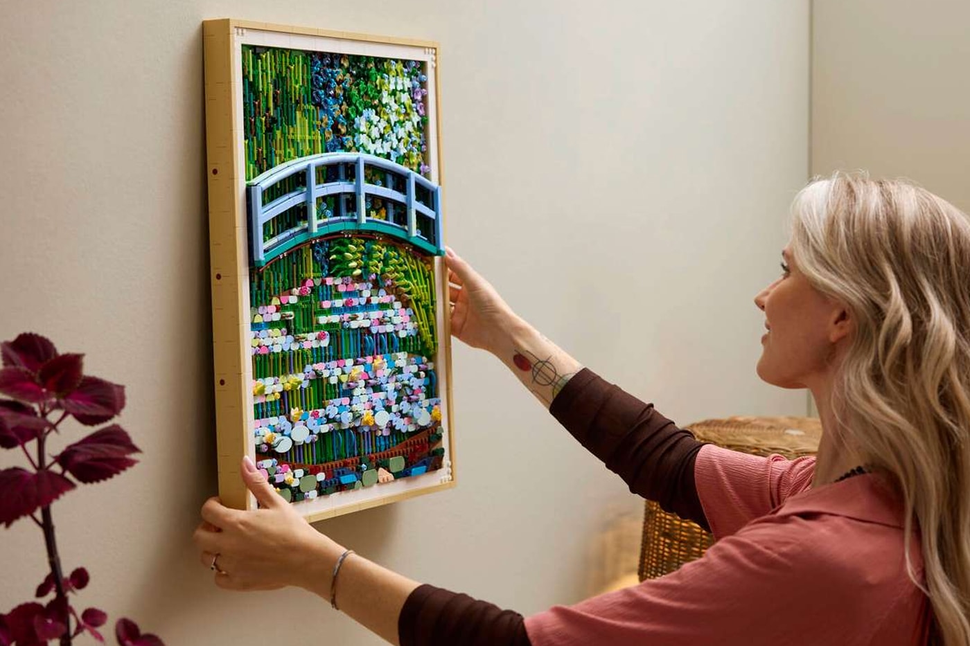 LEGO and The Met Recreate Monet's "The Water Lily Pond" Masterpiece in 3,179 Bricks bridge over a pond of water the met metropolitan museum of art new york