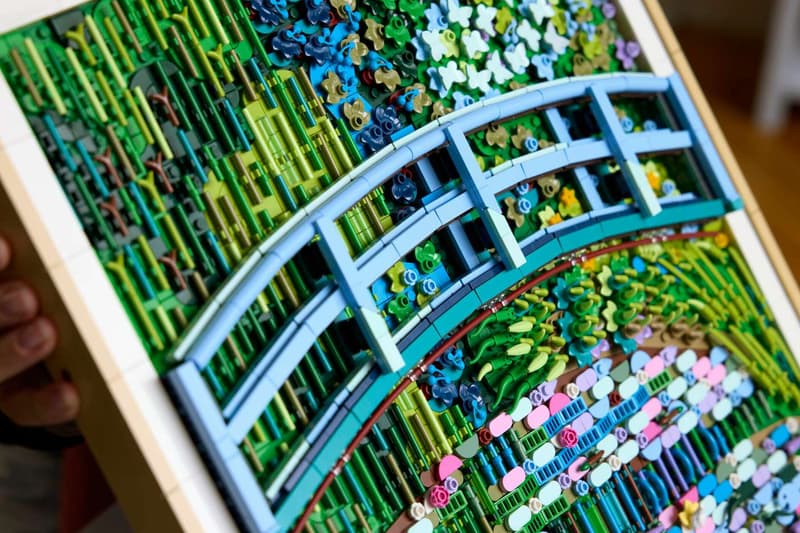 LEGO and The Met Recreate Monet's "The Water Lily Pond" Masterpiece in 3,179 Bricks bridge over a pond of water the met metropolitan museum of art new york