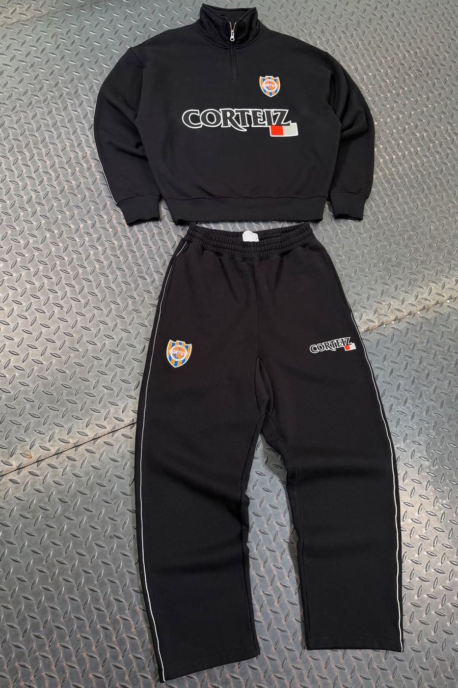 Corteiz's Next Drop Features a Nostalgic New Era Collaboration apparel alacatraz sweatpants sweaters hoodies sets velour tracksuits nylon athletic look uk brand grime collaboration